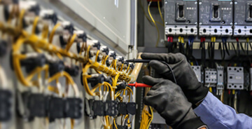 Technician working on electrical testing
